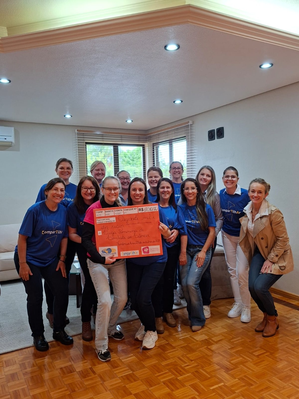 Entrega do valor foi realizada por representantes do time ComparTilhAr.   (Foto: Divulgação/CTA Continental) Entrega do valor foi realizada por representantes do time ComparTilhAr.   (Foto: Divulgação/CTA Continental)